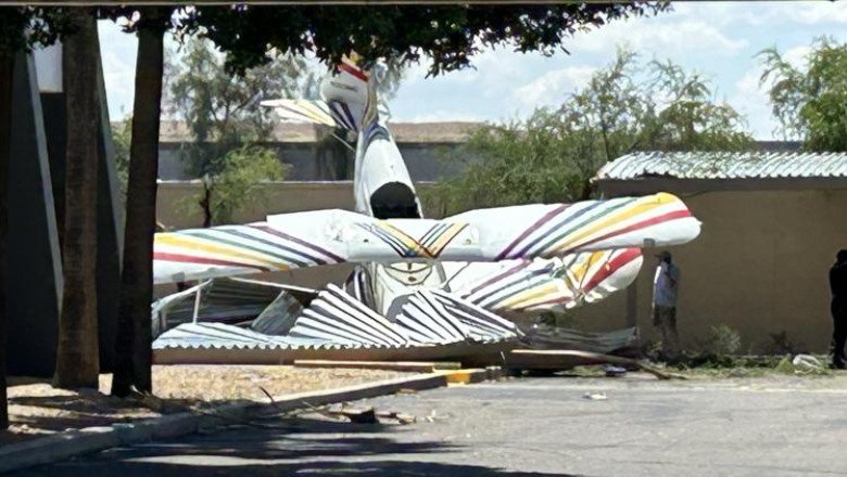 Plane goes down near building in north Phoenix; no injuries