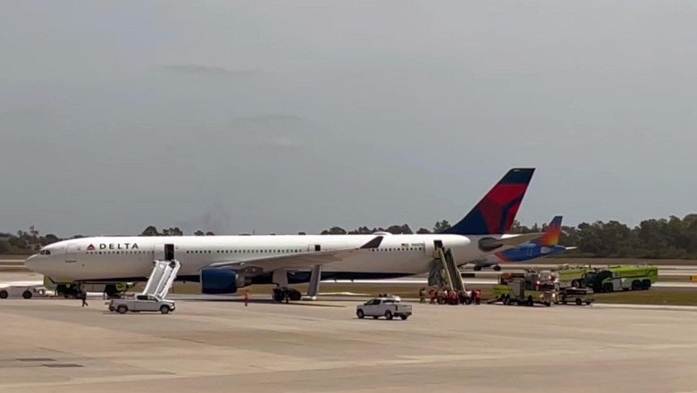 Delta plane engine catches fire at Orlando airport, passengers evacuate on slides