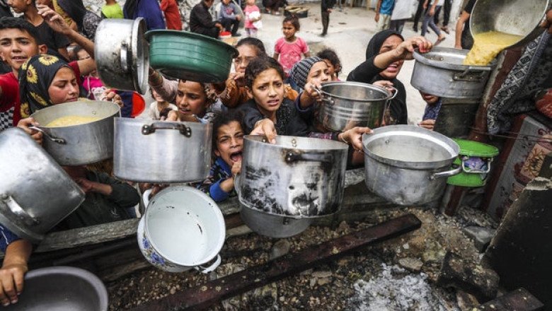 Israel lets limited aid into Gaza, as Netanyahu says allies can’t tolerate “images of mass famine”