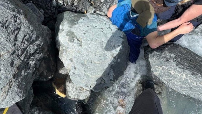 Alaska man unscathed after being pinned for hours by 700-pound boulder