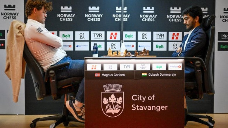 Magnus Carlsen, No. 1 ranked chess player, slams fist onto table after losing to world champ Gukesh Dommaraju