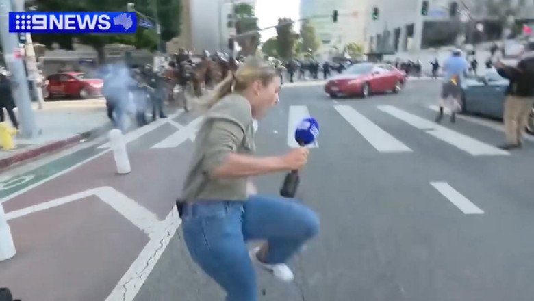 Australian reporter covering Los Angeles immigration protests hit by rubber bullet on live TV