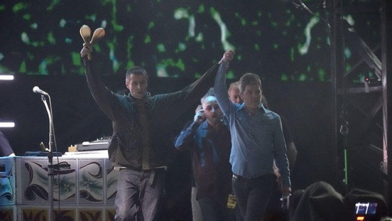 Britpop rockers Oasis reunite for first concert in 16 years