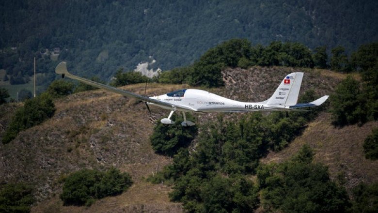 Pilot breaks altitude record for solar-powered plane, crossing paths with commercial airliner, his team says