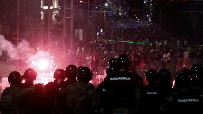 Serbia's police use tear gas as they clash with anti-government protesters in Belgrade