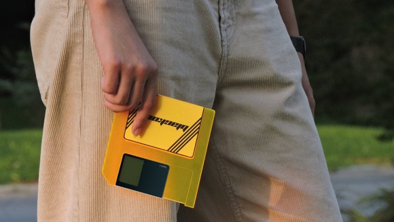 The floppy disk returns as a design concept for SD cards, bridging eras of storage from megabytes to terabytes