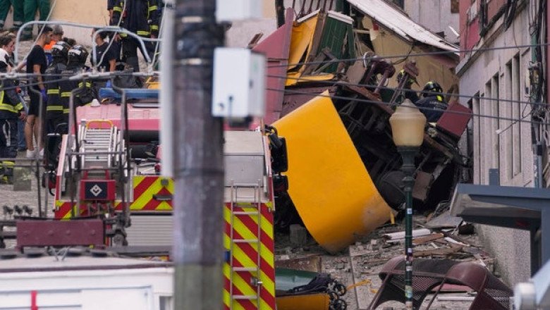 Lisbon funicular crash kills at least 15 people when popular streetcar derails